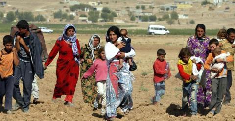 Refugiados sirios huyen de los combates del grupo yihadista Estado Islámico