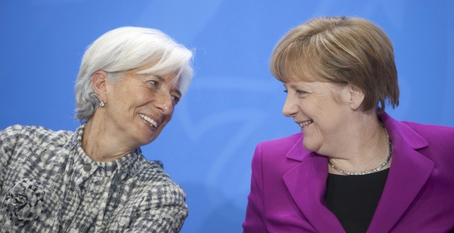 La directora gerente del FMI, Christine Lagarde, junto a la canciller alemana, Angela Merkel. - REUTERS