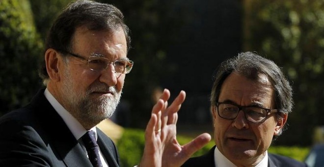 El presidente del Gobierno, Mariano Rajoy, y el presidente de la Generalitat, Artur Mas, a su llegada a la reunión de los ministros de Exteriores de la Unión Europea y de los países de la ribera sur del Mediterráneo./ EFE