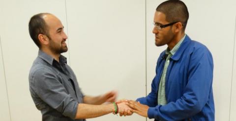 Gheorghe Berchesan y Wilder Palacio, en una reunión de ICV-EUIA. / C. TULBURE