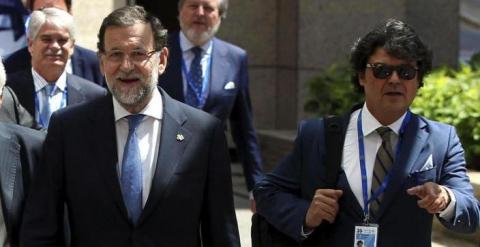 Mariano Rajoy, con Jorge Moragas y el ministro de Asuntos Exteriores, José Manue García Margallo. EFE