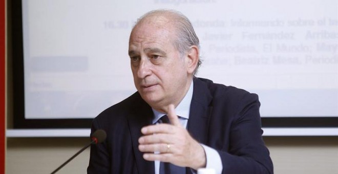 El ministro del Interior, Jorge Fernández Díaz, en los cursos de verano de El Escorial. / EFE