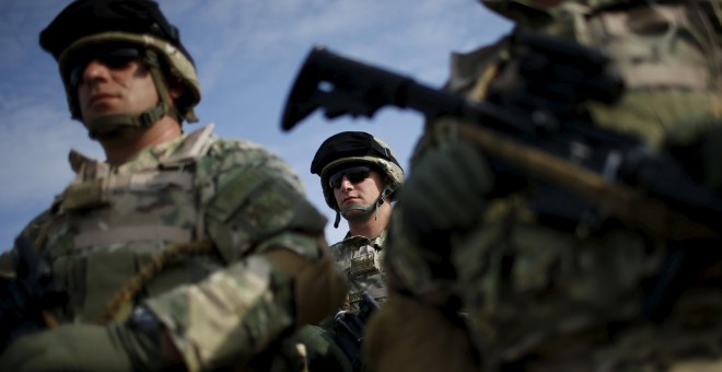 Servicemen attend a farewell ceremony at the Vaziani military base outside Tbilisi, Georgia, September 30, 2015. According to Georgia's Defence Ministry, the servicemen, comprised of members of the 22nd battalion from the II infantry brigade of the Georgi