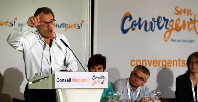 El presidente catalán en funciones y líder de CDC, Artur Mas, durante su intervención ante los cuadros de su partido en el consejo nacional de la formación, en el inicio de las negociaciones con la CUP sobre los detalles del proceso soberanista y su posib