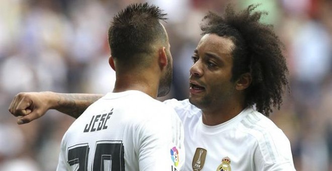 Jesé celebra con Marcelo su gol al Las Palmas. EFE/Ballesteros