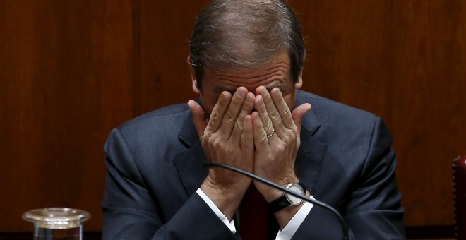 El conservador Pedro Passos Coelho gesticula durante el debate en el Parlamento de Lisboa. - REUTERS