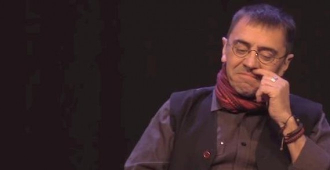 Gesto de Monedero durante la charla