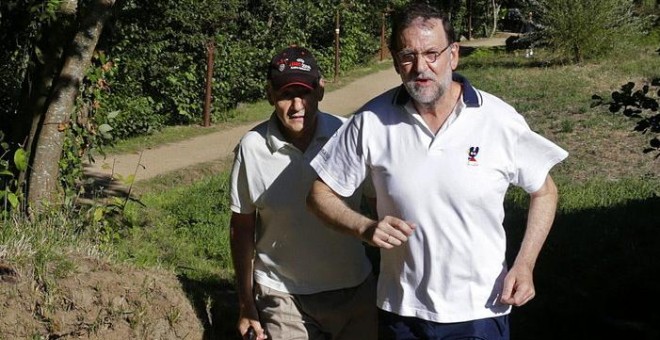 Rajoy hace 'footing' en sus vacaciones de este verano en la Ruta da Pedra e da Auga.