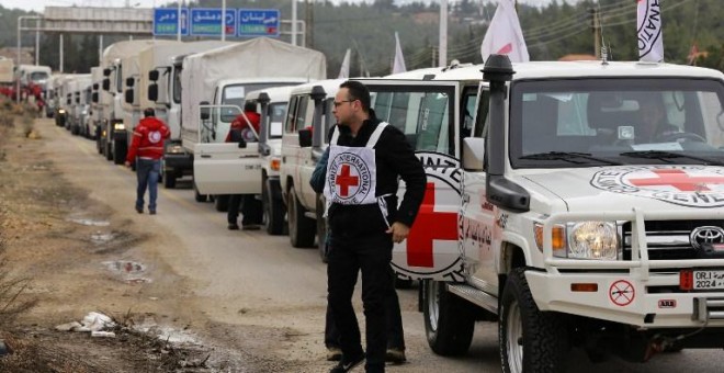 El convoy conjunto de la CICR, la Media Luna Roja y el Programa Mundial de Alimentos de la ONU llegan a Madaya. - AFP