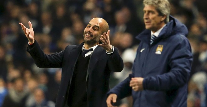 Guardiola junto a Pellegrini en un partido de Champions de la temporada pasada. /REUTERS