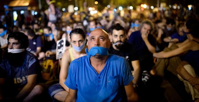 Manifestación en Madrid contra la entrada en vigor de la Ley de Seguridad Ciudadana, conocida como la 'ley mordaza'. AFP