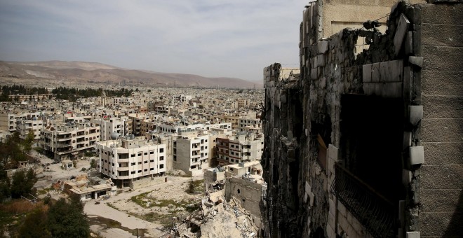 Vista general de los daños en los edificios de uno de los barrios de Damasco. REUTERS/Bassam Khabieh