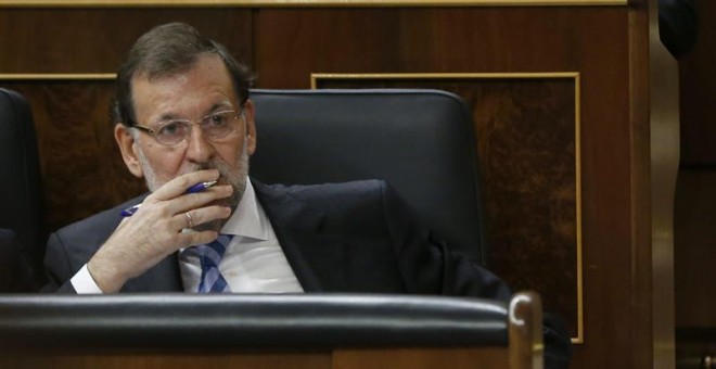El presidente del Gobierno en funciones, Mariano Rajoy, en su escaño del Congreso. Archivo EFE