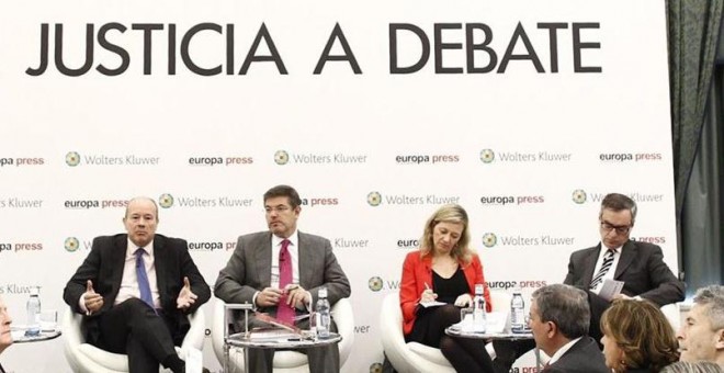 Juan Carlos Campo (PSOE), Rafael Catalá (PP), Victoria Rosell (Podemos) y José Manuel Villegas (C's) en el evento 'La Justicia a debate'. EUROPA PRESS
