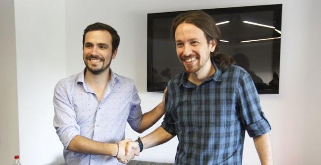 Pablo Iglesias y Alberto Garzón durante las conversaciones. EUROPA PRESS