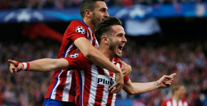 Saúl celebra con Koke su gol al Bayern. Reuters / Sergio Perez