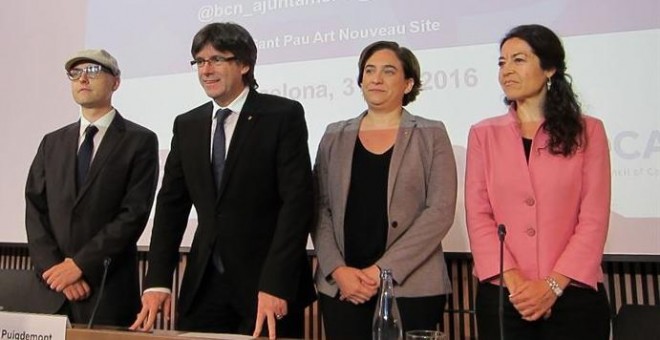 El presidente de la Generalitat, Carles Puigdemont, y la alcaldesa de Barcelona, Ada Colau durante el Foro Internacional de Recepción e Integración de Refugiados en la UE. EP