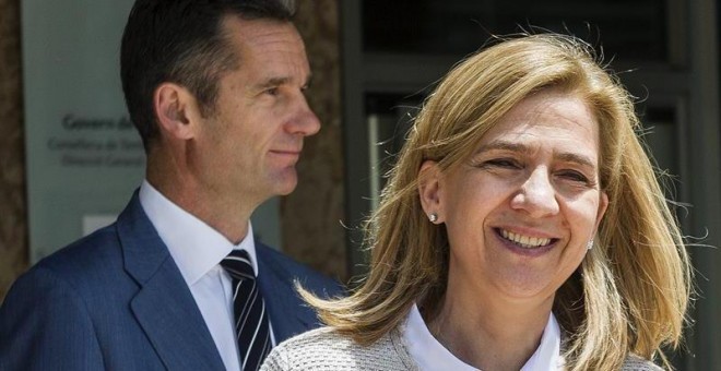 La infanta Cristina y su marido, Iñaki Urdangarin, a la salida de la sede de la Escuela Balear de la Administración Pública (EBAP) de Palma tras asistir a la presentación de las conclusiones del juicio del caso Nóos. EFE/Cati Cladera