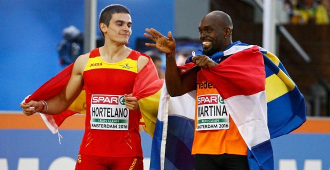 Bruno Hortelano y Churandy Martina, tras la final. REUTERS/Michael Kooren