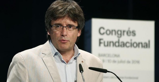 El presidente de la Generalitat, Carles Puigdemont, durante su intervención al término del Congreso Fundacional de la nueva Convergencia celebrado este fin de semana en el Centro de Convenciones Internacional de Barcelona, en el que se ha decidido que a p