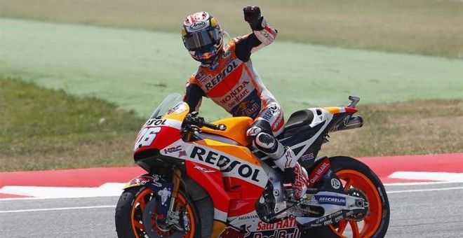 Dani Pedrosa saluda tras ganar en el GP de San Marino.