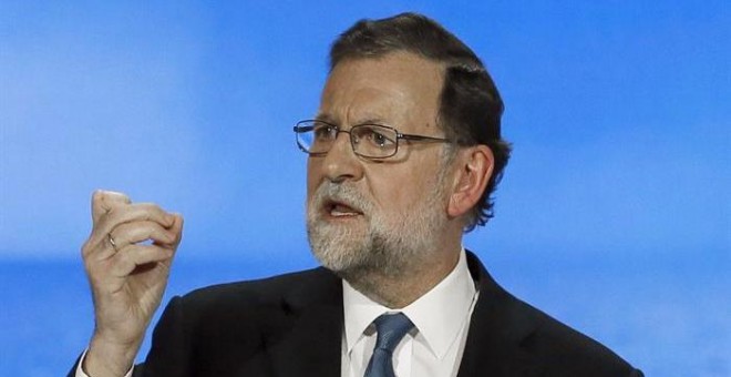 El presidente del Gobierno y del PP, Mariano Rajoy, durante su intervención en la segunda jornada del XVIII Congreso nacional del partido que se celebra hasta mañana en la Caja Mágica de Madrid. EFE/JuanJo Martín