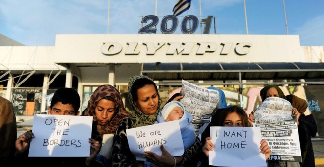 Inmigrantes en Atenas. REUTERS/Michalis Karagiannis