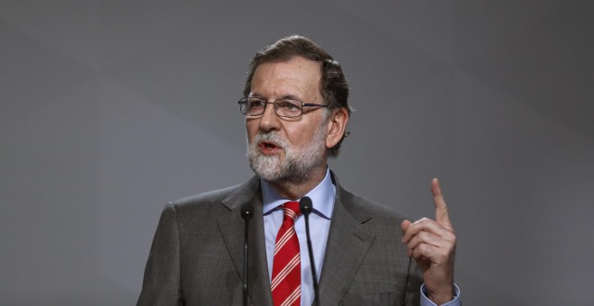 El jefe del Ejecutivo, Mariano Rajoy, durante su comparecencia ante los periodistas tras presidir la reunión del Comité Ejecutivo Nacional del PP. EFE/Emilio Naranjo