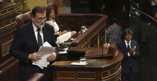 El presidente del Gobierno, Mariano Rajoy, tras una de sus intervenciones en el debate de la moción de censura de Unidos Podemos. EFE/Ballesteros