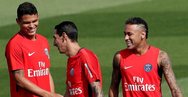 Neymar, Thiago Silva and Angel Di Maria durante un entrenamiento del Paris St Germain. REUTERS/Benoit Tessier