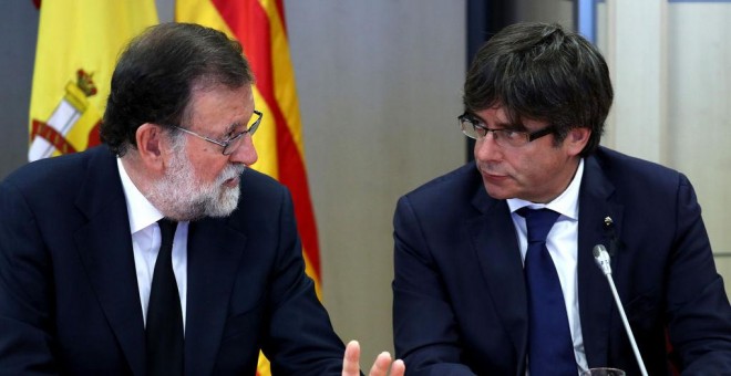El presidente del Gobierno, Mariano Rajoy, y el presidente de la Generalitat de Cataluña, Carles Puigdemont / EFE