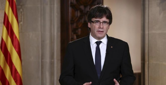 El presidente Puigdemont durante su mensaje institucional. | EFE