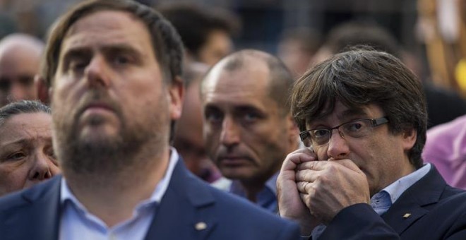 Junqueras y Puigdemont, en la manifestación de Barcelona del sábado. EFE/Enric Fontcuberta