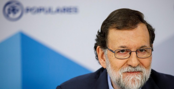 El presidente del Gobierno y del PP, Mariano Rajoy, en una reunión de la dirección del partido conservador en su sede en la madrileña calle de Génova. REUTERS/Juan Medina