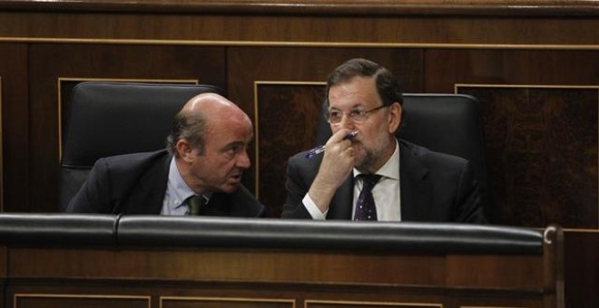 Mariano Rajoy y Luis De Guindos en el Congreso de los Diputados. EUROPA PRESS