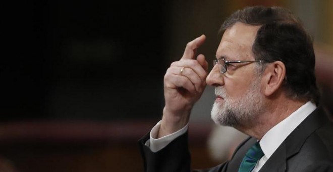 31/05/2018.- El presidente del Gobierno, Mariano Rajoy, durante su intervención ante el pleno del Congreso, en la primera jornada de la moción de censura presentada por el PSOE contra el Gobierno. EFE/ Javier Lizón