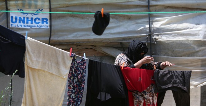 Una mujer siria en un campamento de refugiados en la ciudad de Zahrani, al sur de Líbano. - REUTERS