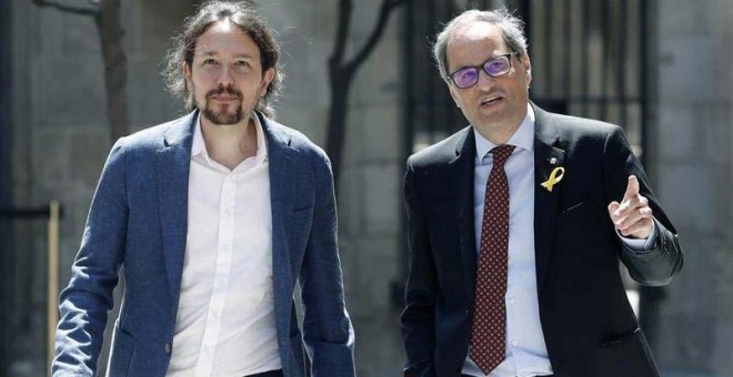 El presidente catalán, Quim Torra, y el secretario general de Podemos, Pablo Iglesias, se han visto en Barcelona. (ANDREU DALMAU | EFE)