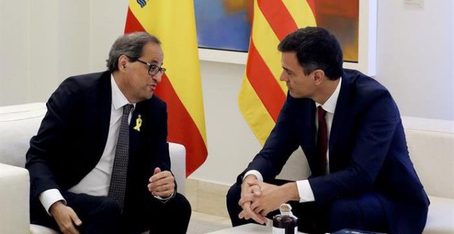 El presidente del gobierno Pedro Sánchez y el president de la Generalitat Quim Torra, durante la reunión de este lunes. /EFE