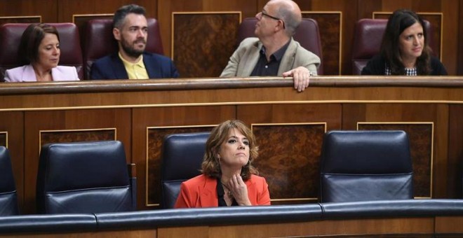 La ministra de Justicia, Dolores Delgado, en su escaño durante el pleno del Congreso de los Diputados. EFE/Fernando Villar