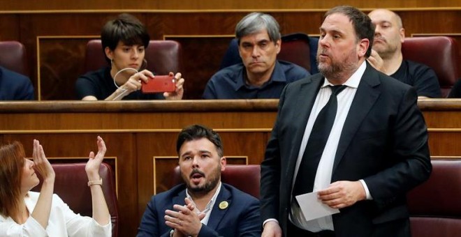 Oriol Junqueras, cuando ha intentado pronunciar su mensaje. - EFE