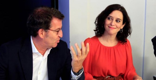 Isabel Díaz Ayuso junto al presidente de la Xunta de Galicia, Alberto Núñez Feijóo. (FERNANDO ALVARADO | EFE)