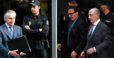 Miguel Blesa, a la izquierda, y Rodrigo Rato, a la derecha, a su salida de la Audiencia Nacional, tras declarar ante el juez Fenando Andreu.