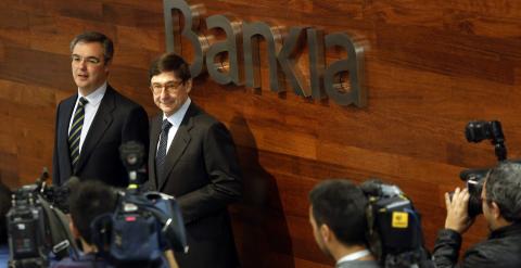 El presidente de Bankia, Jose Ignacio Goirigolzarri, y el consejero delegado, Jose Sevilla, en la presentación de resultados de 2014 de la entidad  nacionalizada. REUTERS/Susana Vera