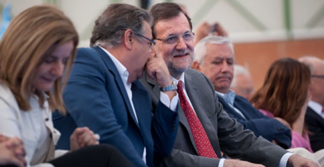 RAJOY Y ARENAS