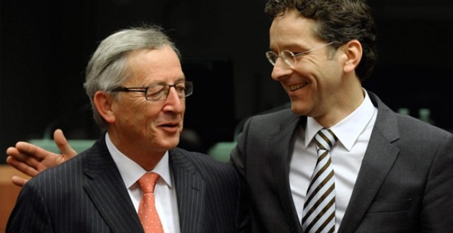 Jean-Claude Juncker y Jeroen Dijsselbloem, quien sucedió al primero al frente del Eurogrupo.