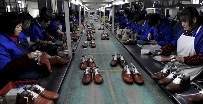 Trabajadoras de una fábicra de calzado en Lishui, en la provincia china de Zhejiang. REUTERS/Lang Lang