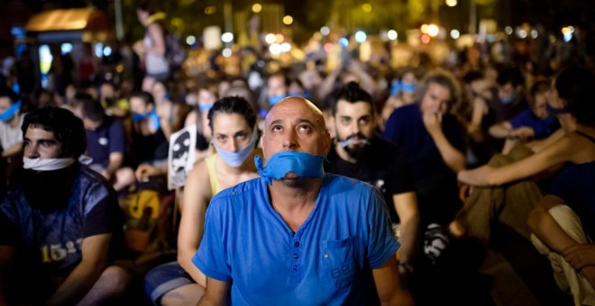 Manifestación en Madrid contra la entrada en vigor de la Ley de Seguridad Ciudadana, conocida como la 'ley mordaza'. AFP