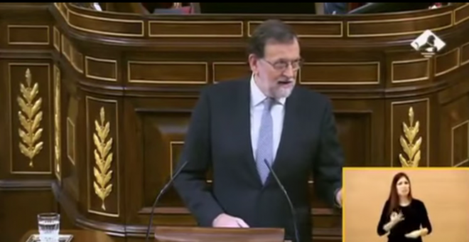 Rajoy durante el debate de investidura.-