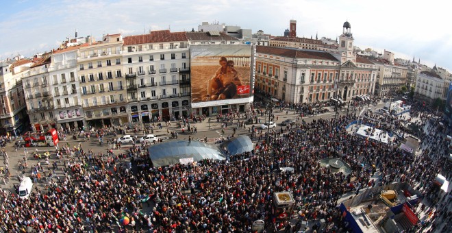 People fill Puerta del Sol square during a march to mark the 5th anniversary of the "indignados" movement in Madrid, Spain, May 15, 2016. Picture taken with an eye fish lens. REUTERS/Sergio Perez